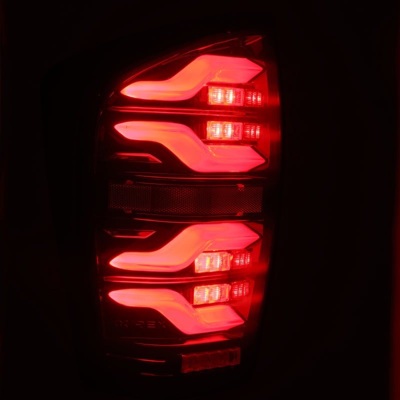 AlphaRex 680000 fits Toyota 16-21 Tacoma LUXX LED Taillights Blk/Red w/Activ Li