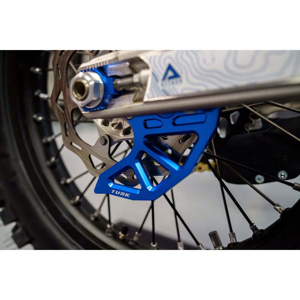Tusk 1857240016 Rear Brake Caliper Support w/ Brake Disc Guard Blue