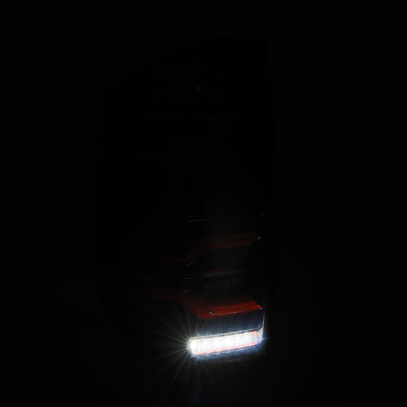AlphaRex 672050 fits Toyota 14-21 Tundra LUXX LED Taillights Black/Red w/Activ