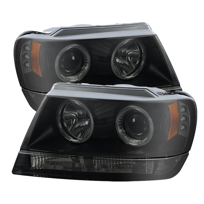 Spyder 5078568 fits Jeep 99-04 Grand Cherokee Projector Headlights LED Halo LED