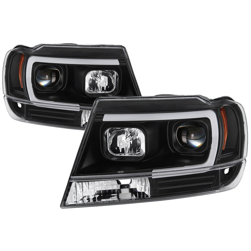 Spyder 5085221 fits Jeep 99-04 Grand Cherokee Projector Headlights - Light Bar