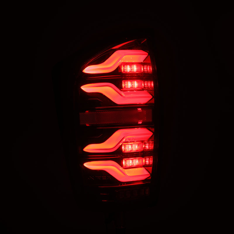 AlphaRex 680080 fits Toyota 16-21 Tacoma LUXX LED Taillights Alpha Blk w/Activ