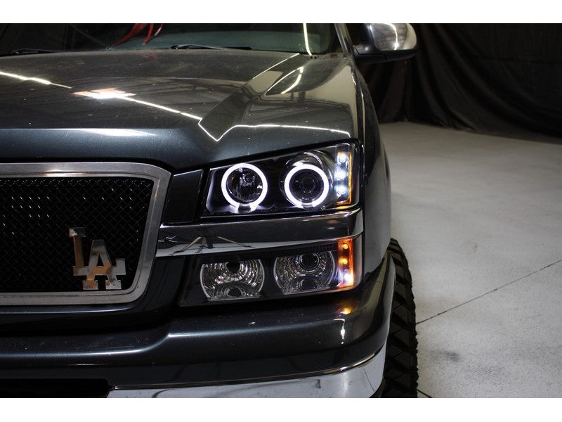 Spyder 5009456 fits Chevy 03-06 Silverado 1500 Projector LED Halo LED Amber Ref