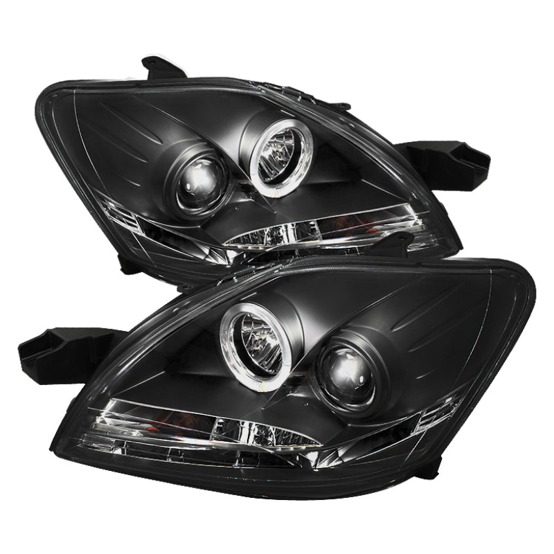 Spyder 5038944 fits Toyota 07-11 Yaris 4Dr Projector Headlights LED Halo DRL Bl