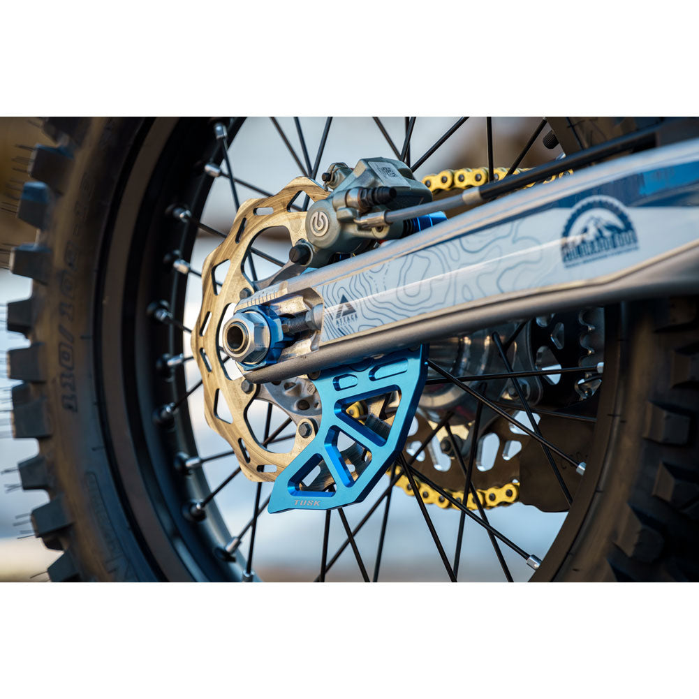 Tusk 1857240016 Rear Brake Caliper Support w/ Brake Disc Guard Blue