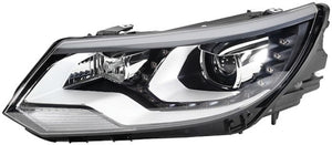 Hella LA010748351 12-14 fits Volkswagen Tiguan Headlamp Xenon Lh