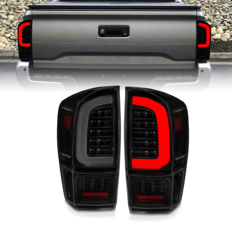 ANZO 311401 fits Toyota 16-21 Tacoma LED Tail Lights - w/ Light Bar Sequential Black Housing & Smoke Lens