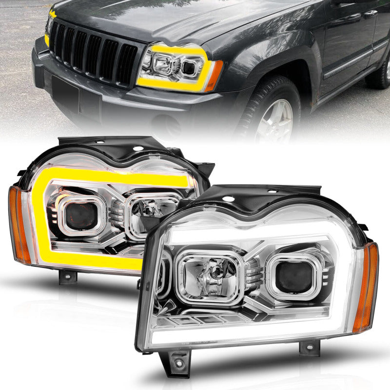 ANZO 111544 fits Jeep 05-07 Grand Cherokee Projector Headlights - w/ Light Bar Switchback Chrome Housing