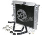 AFE 46-50012-B unner GT Series Bar and Plate Radiator w/ Black Hoses 12-18 fits