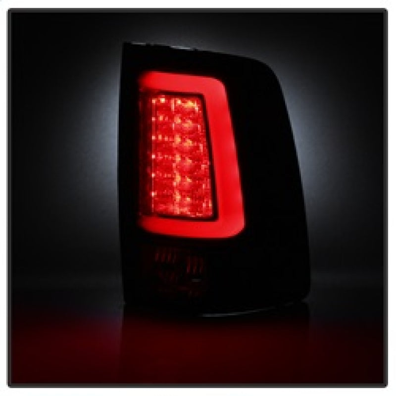 Spyder 5084064 fits Dodge 13-14 Ram 1500 Light Bar LED Tail Lights - Black Smok