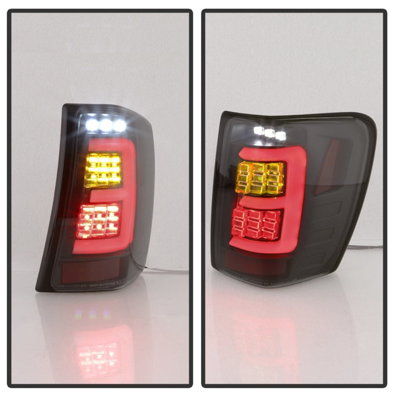 Spyder 5086150 fits Jeep 99-04 Grand Cherokee - Light Bar Led Tail Lights - Bla