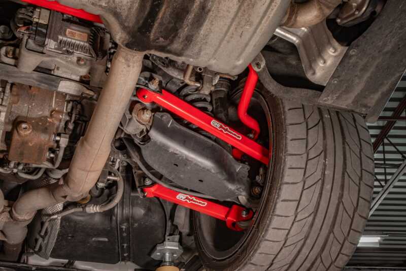 UMI Performance 2543-RUMI 16-24 fits Chevrolet Camaro Alignment Toe Arm - Red