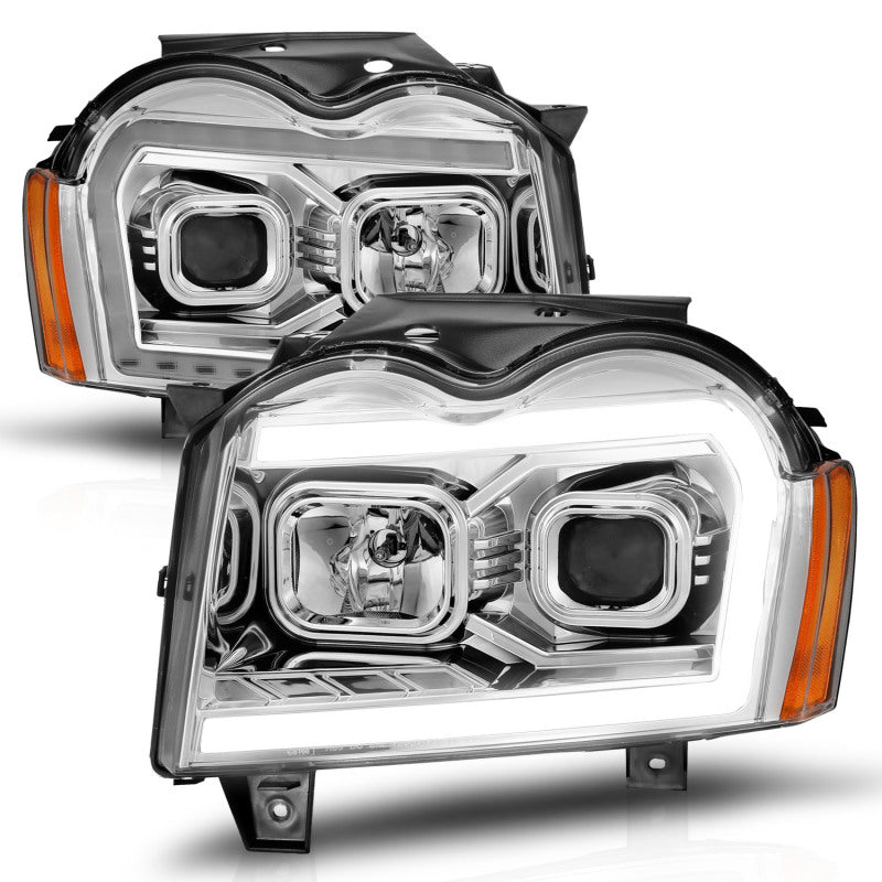 ANZO 111544 fits Jeep 05-07 Grand Cherokee Projector Headlights - w/ Light Bar Switchback Chrome Housing