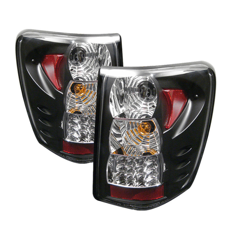 Spyder 5005656 fits Jeep 99-04 Grand Cherokee (LED Indicator)LED Tail Lights Bl