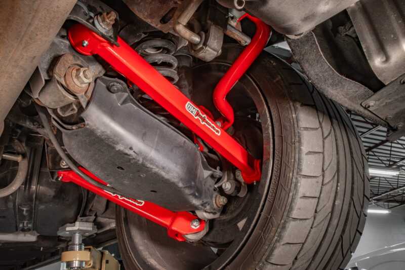 UMI Performance 2543-RUMI 16-24 fits Chevrolet Camaro Alignment Toe Arm - Red