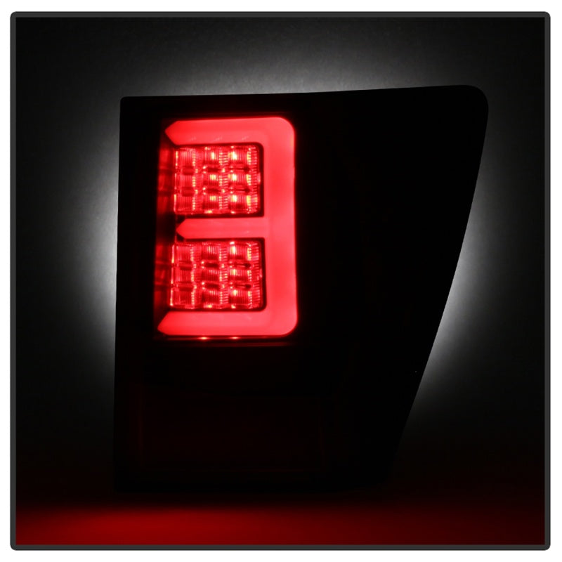 Spyder 5086655 fits Jeep 07-10 Grand Cherokee Light Bar LED Tail Lights - Black
