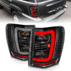 ANZO 311394 1904 fits Jeep 99-20 Grand Cherokee LED Tail Lights w/ Light Bar Black Housing Clear Lens