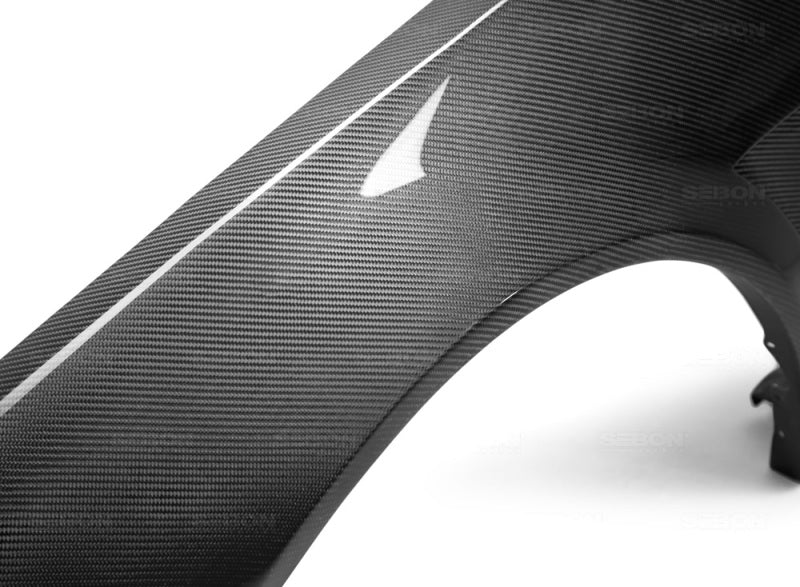 Seibon FF9901NSR34-NSW fits Nissan 99-01 Skyline R34 NSW-Style Carbon Fiber (Gloss Finish) Fenders (Pair)