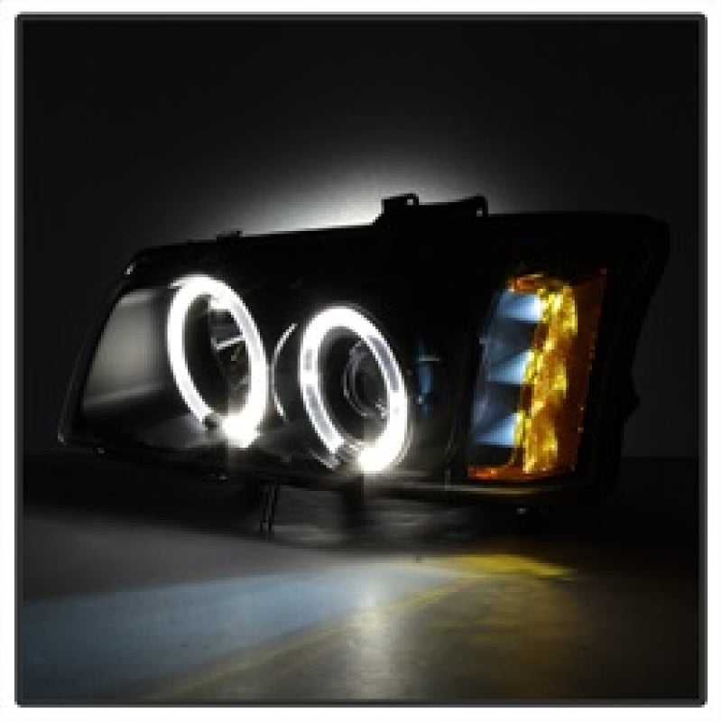 Spyder 5009456 fits Chevy 03-06 Silverado 1500 Projector LED Halo LED Amber Ref